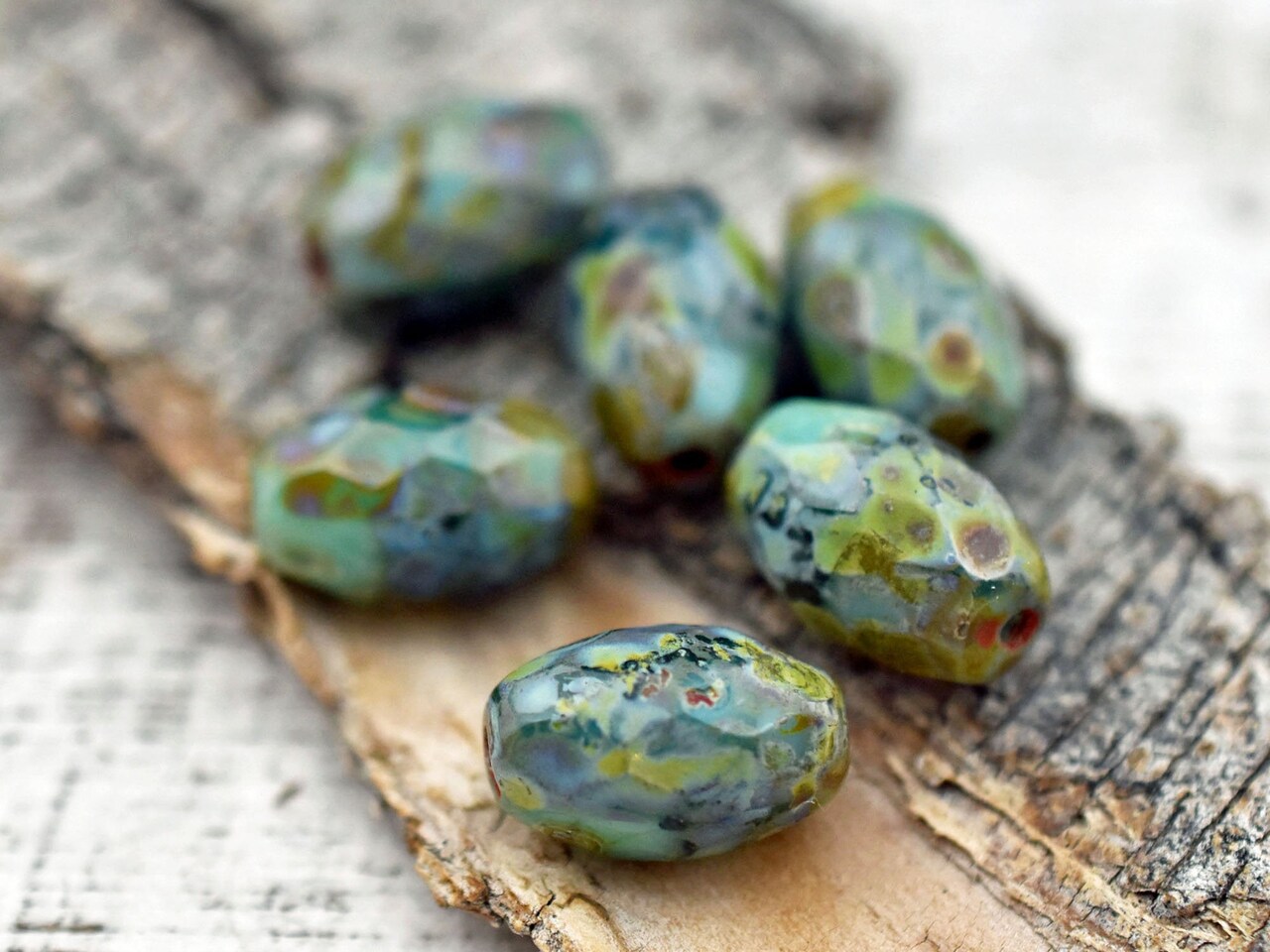 *12* 12x8mm Mottled Turquoise Picasso Fire Polished Faceted Oval Beads